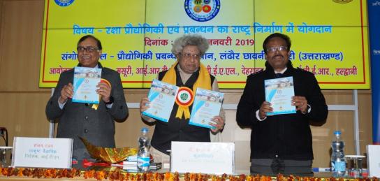 Dr Pranav Pandya, Chancellor, Dev Sanskrity Vishwavidhyalaya, Haridwar releasing 'Sangoshthi Smarika' during inauguration function. Director ITM and Director IRDE also in picture